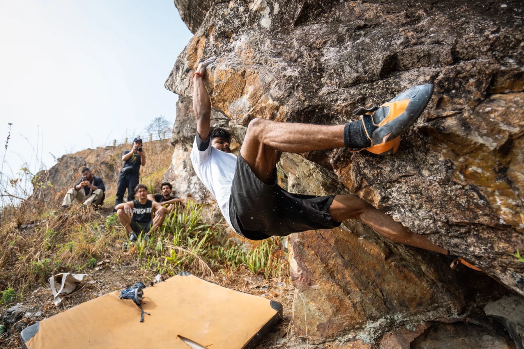 Topping out a boulder