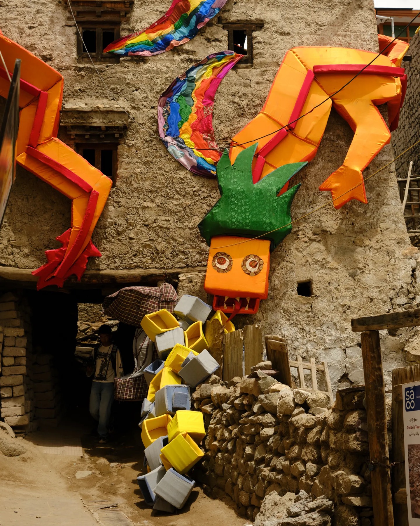 Colourful installation on a village wall